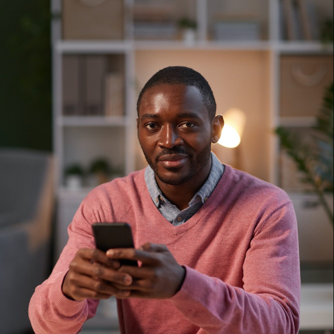 businessman-using-mobile-phone-e1612690090941.jpg
